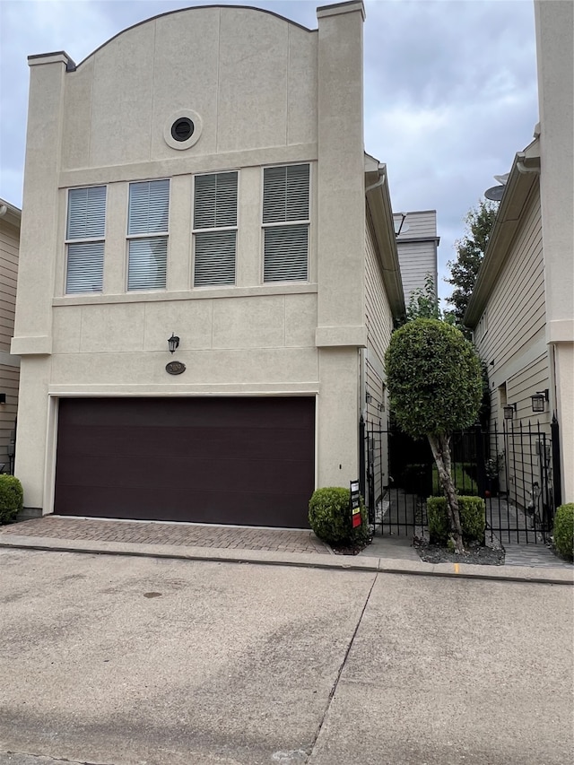 view of front of property featuring a garage