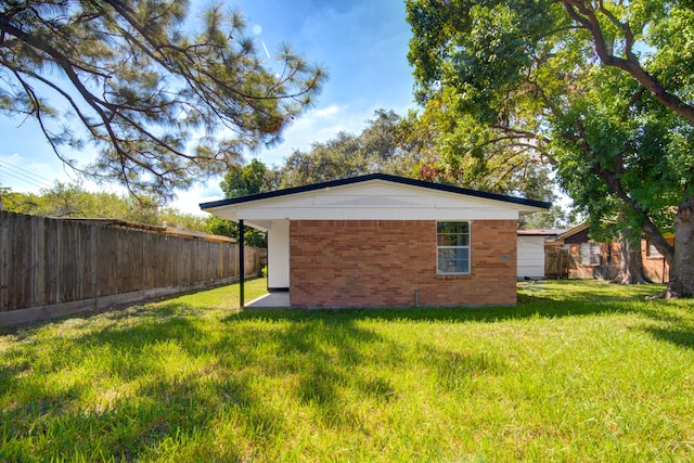 view of property exterior with a lawn