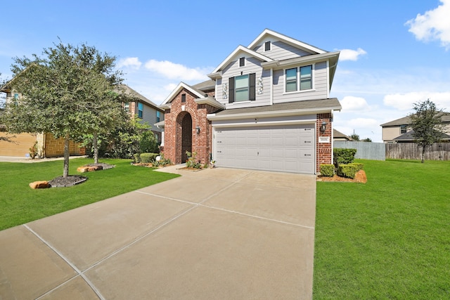 craftsman-style house featuring a front yard and a garage