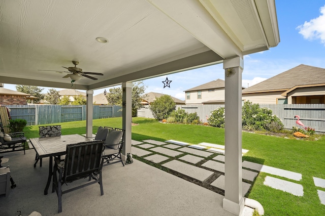 view of patio / terrace featuring ceiling fan