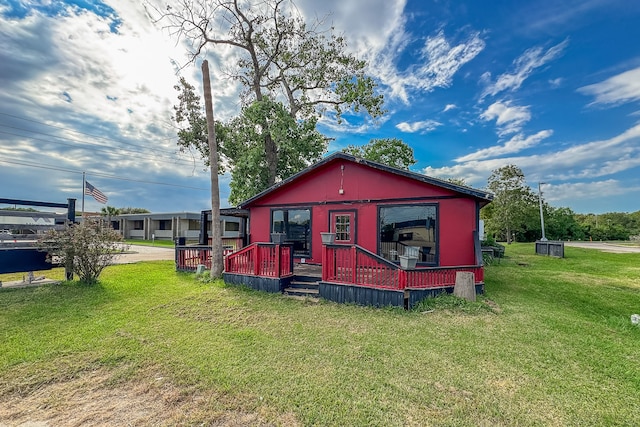 view of outbuilding with a lawn