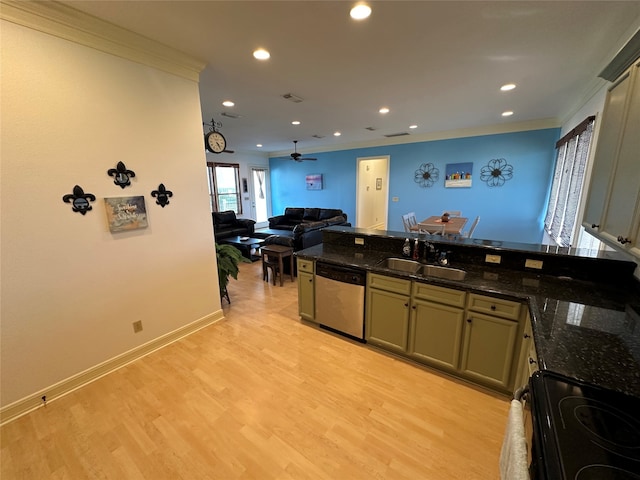 kitchen featuring light hardwood / wood-style flooring, dark stone countertops, sink, and stainless steel dishwasher