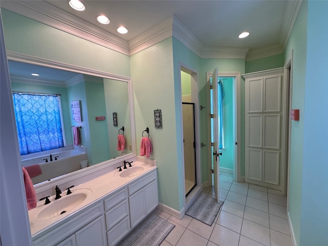 bathroom with ornamental molding, tile patterned floors, vanity, and independent shower and bath