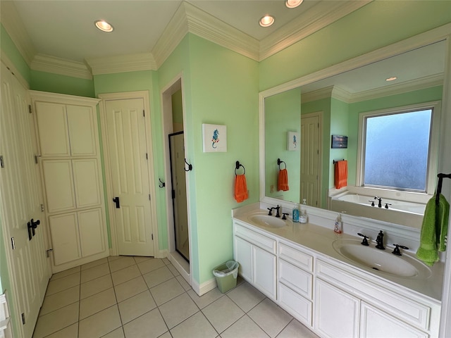 bathroom featuring ornamental molding, vanity, tile patterned flooring, and walk in shower