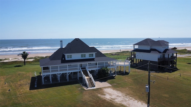 aerial view featuring a beach view and a water view