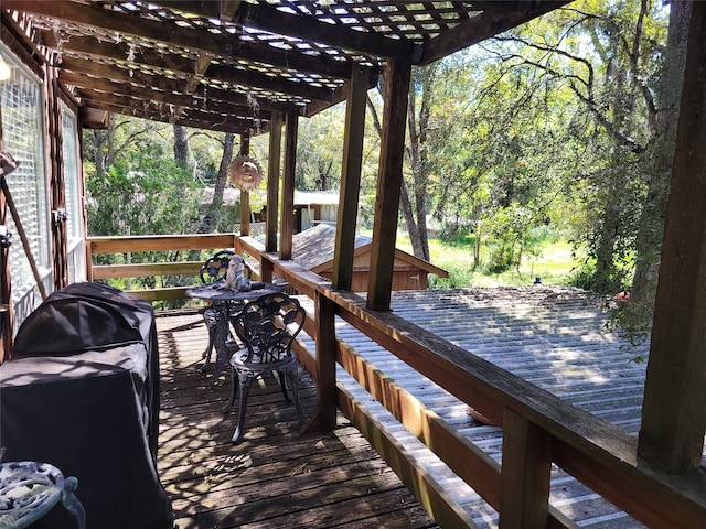 wooden terrace featuring a pergola