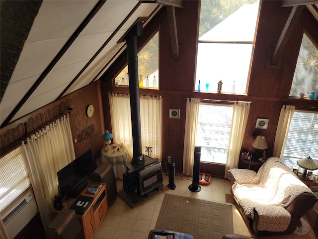 interior space featuring wood walls and vaulted ceiling