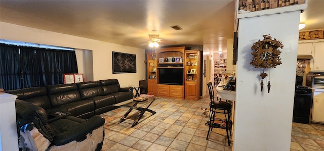 living room with ceiling fan