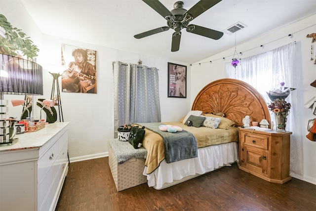 bedroom featuring ceiling fan and dark hardwood / wood-style flooring