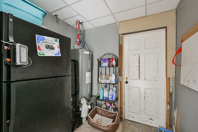 utility room featuring water heater