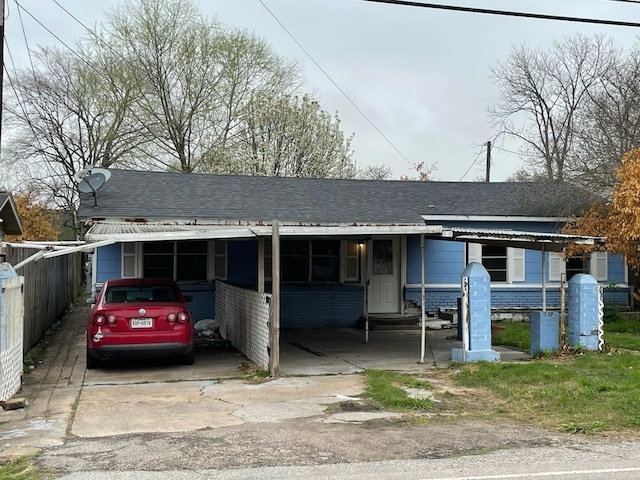 view of front of house featuring a carport