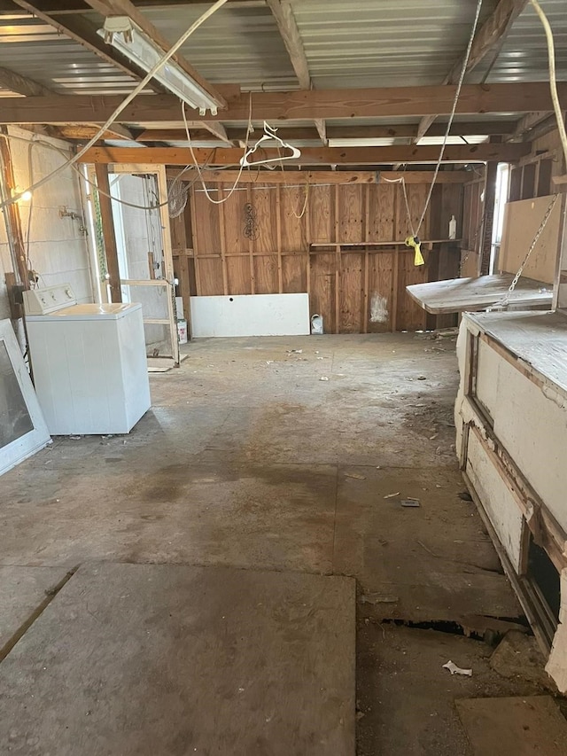 basement with separate washer and dryer