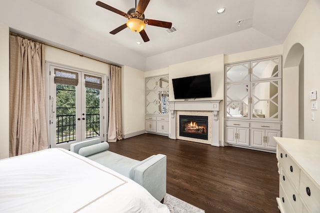 bedroom featuring ceiling fan, dark wood-type flooring, french doors, and access to exterior