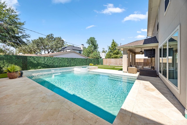 view of pool with an in ground hot tub and a patio