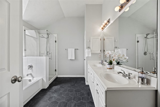 bathroom with vanity, plus walk in shower, vaulted ceiling, and a textured ceiling