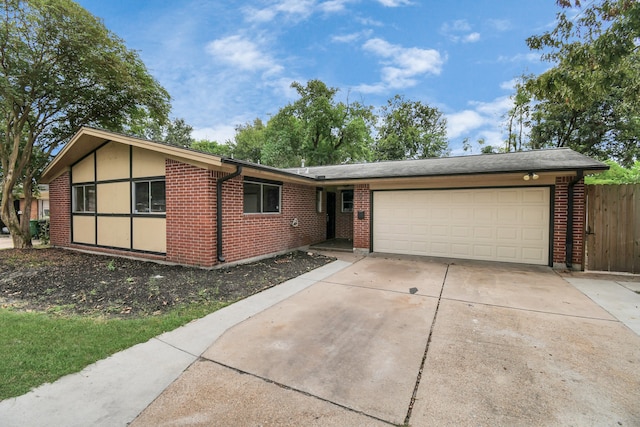 ranch-style home with a garage