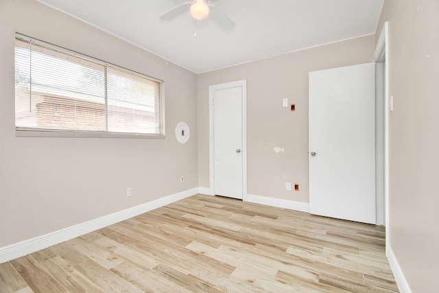 unfurnished bedroom with light hardwood / wood-style floors and ceiling fan