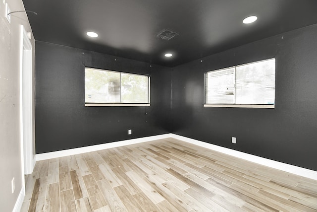 empty room featuring light hardwood / wood-style floors