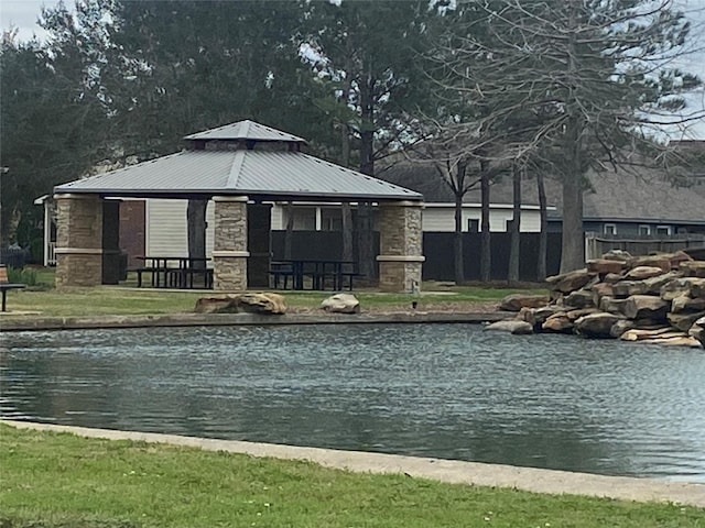 property view of water with a gazebo