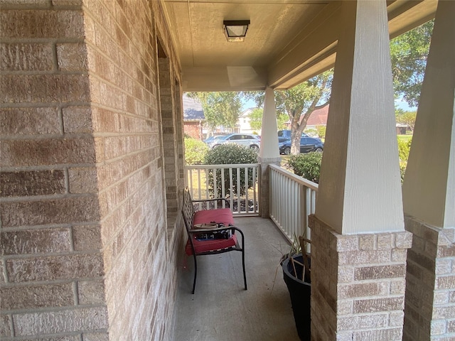 balcony featuring a porch