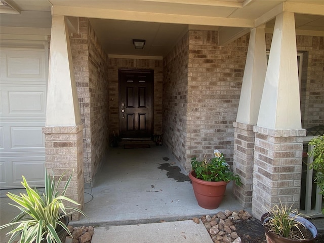 property entrance featuring a garage