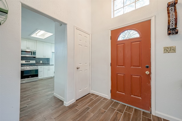 entrance foyer with dark wood-type flooring