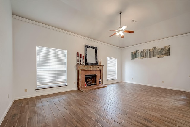 5110 Prairie Creek Dr, Houston, TX 77084 - unfurnished living room with ceiling fan, wood finished floors, baseboards, a fireplace, and crown molding