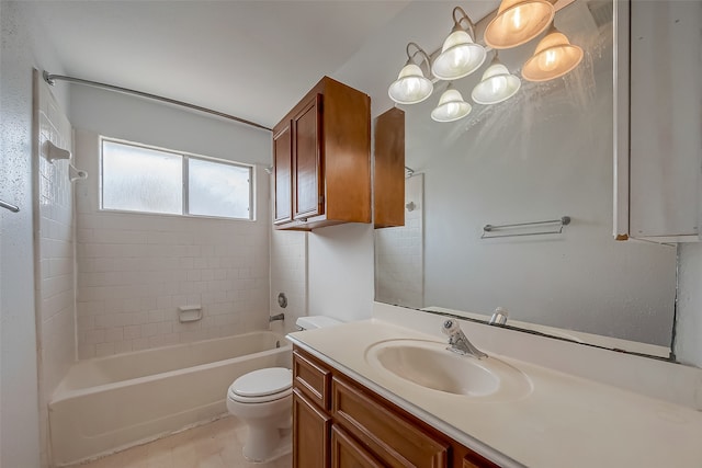 full bathroom with vanity, toilet, and tiled shower / bath