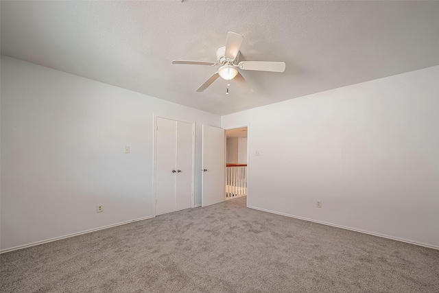 5110 Prairie Creek Dr, Houston, TX 77084 - unfurnished bedroom featuring carpet, ceiling fan, and baseboards