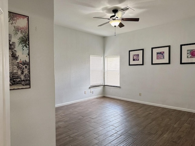 5110 Prairie Creek Dr, Houston, TX 77084 - unfurnished room with a ceiling fan, dark wood-style floors, and baseboards