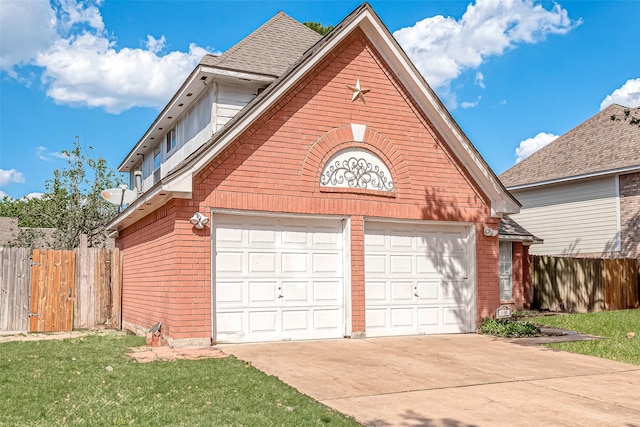 garage with a lawn