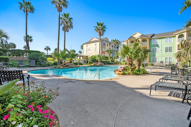 view of swimming pool featuring a patio area