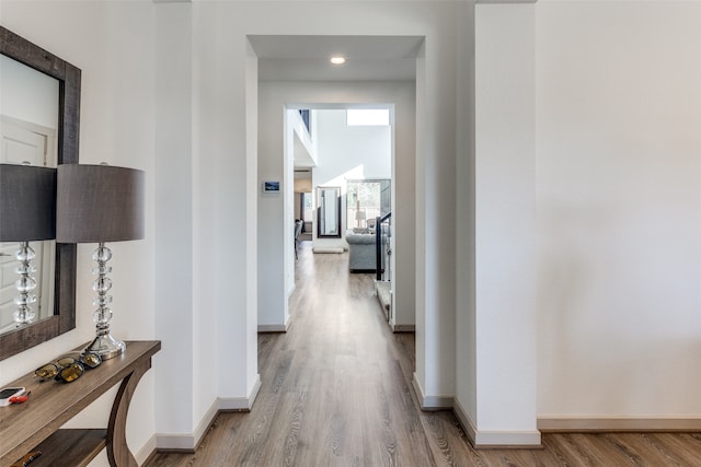 corridor featuring light hardwood / wood-style flooring