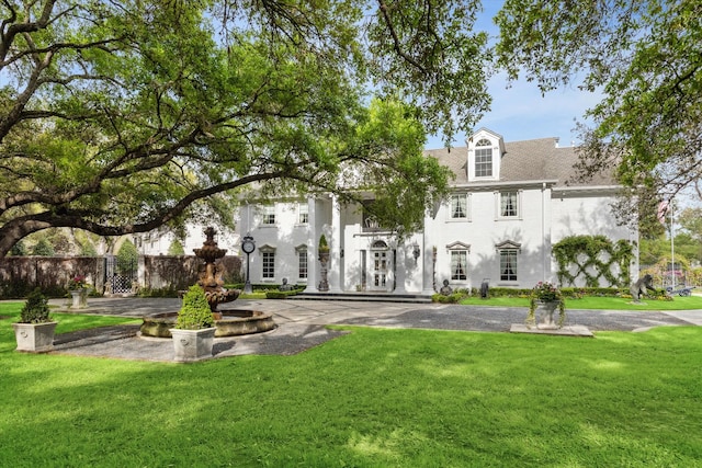 exterior space with a front lawn