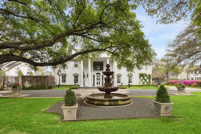 view of front of house with a front yard