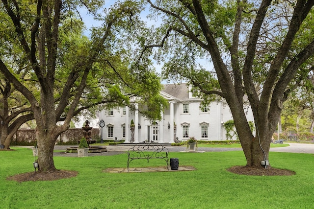 view of community with a yard