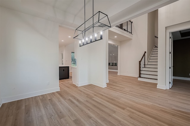 unfurnished dining area with light hardwood / wood-style flooring