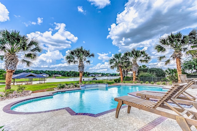 view of pool featuring a water view, a gazebo, and a patio area