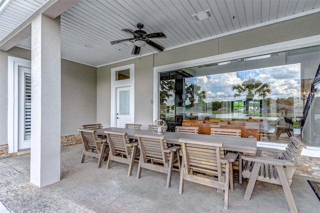 view of patio with ceiling fan