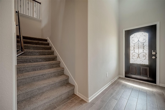3423 Hackberry Tree Ln, Katy, TX 77449 - entrance foyer featuring wood finish floors, stairs, and baseboards