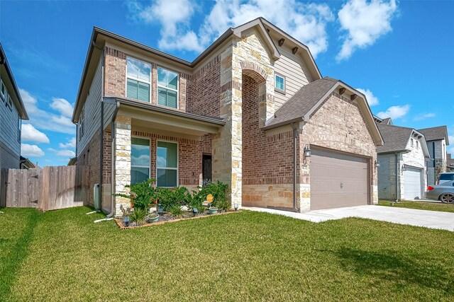 3423 Hackberry Tree Ln, Katy, TX 77449 - traditional home with brick siding, driveway, a garage, stone siding, and a shingled roof