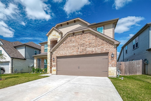3423 Hackberry Tree Ln, Katy, TX 77449 - view of front of home featuring brick siding, a garage, stone siding, and concrete driveway