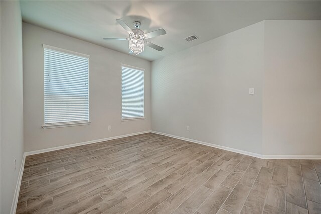 3423 Hackberry Tree Ln, Katy, TX 77449 - unfurnished room featuring wood finished floors, a ceiling fan, and baseboards