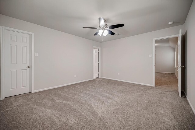 3423 Hackberry Tree Ln, Katy, TX 77449 - unfurnished bedroom with carpet flooring, baseboards, and ceiling fan