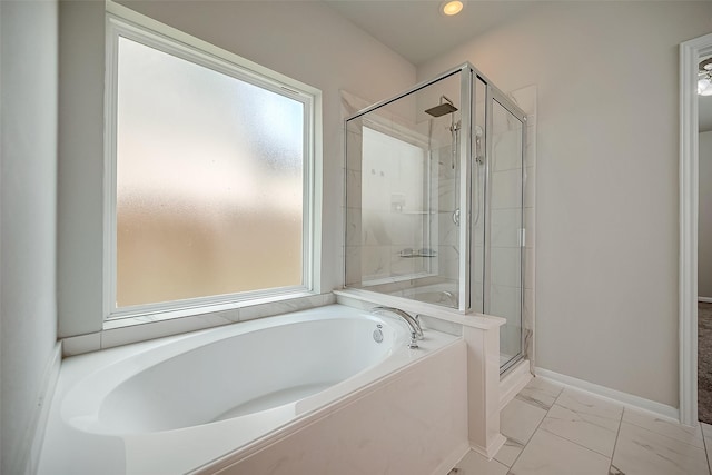 3423 Hackberry Tree Ln, Katy, TX 77449 - bathroom with a garden tub, a shower stall, marble look tile flooring, baseboards, and recessed lighting