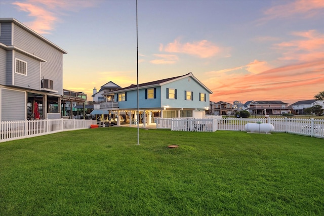 view of yard at dusk