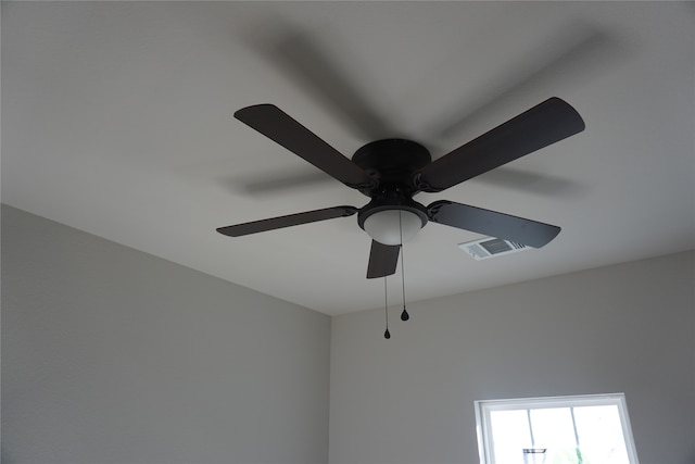 interior details featuring ceiling fan