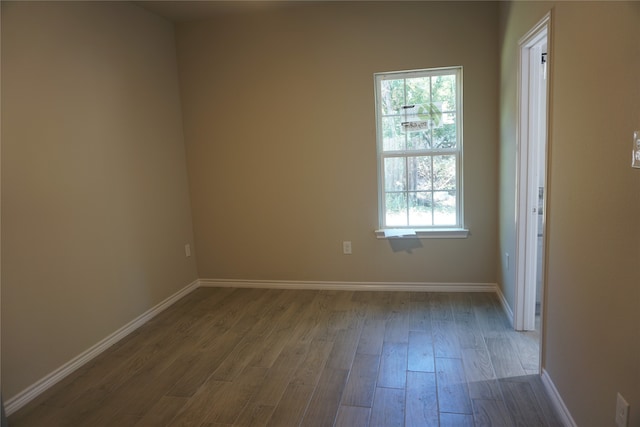 empty room with light hardwood / wood-style floors