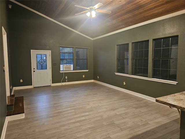 interior space with wood-type flooring, crown molding, and wooden ceiling