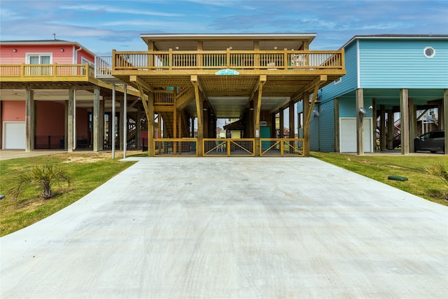 view of front of house featuring a carport and a garage